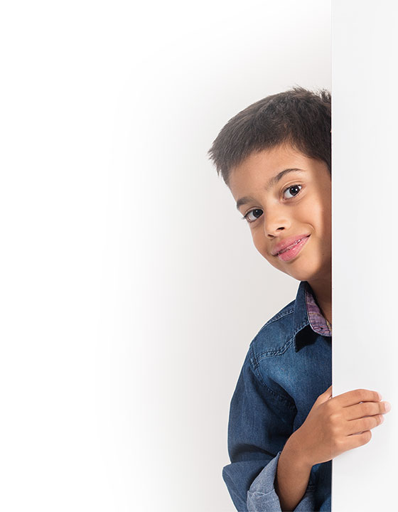 smiling boy behind request form